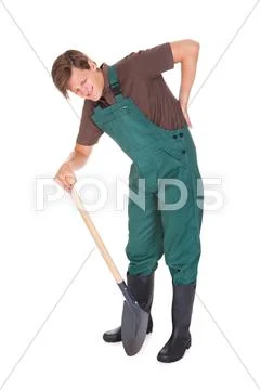 Male gardener suffering from back pain Stock Photos