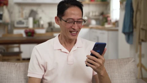 Male getting phone message screaming for winning Video stock 251155002