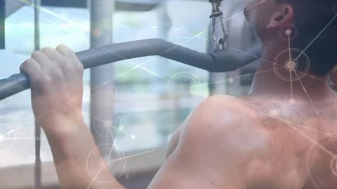 Male gripping lat pulldown bar in gym, pulling toward chest for fitness, overlay Stock Footage 330894796