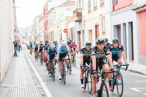 A male group of cyclists riding a bike in Vuelta Ciclista Tenerife Stock Photos