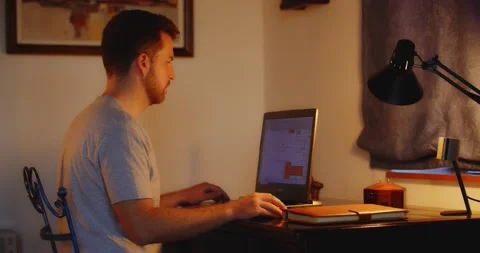 Male Guy Working Remotely from Home Remote Freelancer Stockbeeldmateriaal 195289904