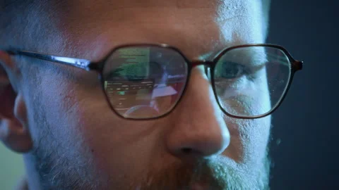 Male Hacker in Glasses Coding on Computer Indoors, Close up Stock Footage 334935448