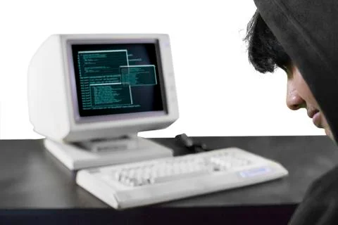 Male hacker sitting in front of computer Stock Photos