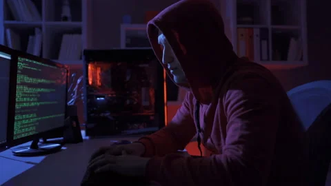 Male hacker using computer to commit a crime. Stock Footage 220160968