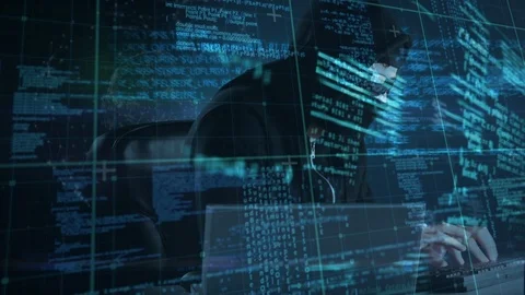 Male hacker using computer to hack the system and coding on the foreground. Stock Footage 104922564