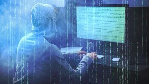 Male hacker working on a computer vs Green Matrix code and smoke on background Stock Photos