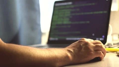 Male hand and program code on the screen 4K Stock Footage 201611863