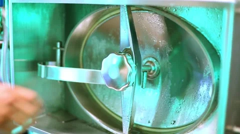 Male hand checks the lid of hatch in horizontal steel tank. Stock Footage 45874053
