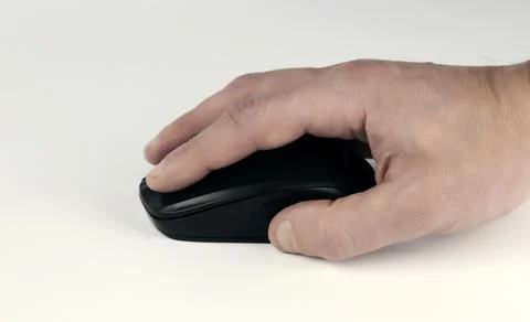 Male hand on computer mouse, close-up on white background Stock Photos