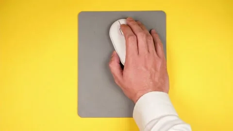 A male hand controls a white computer mo... | Stock Video | Pond5
