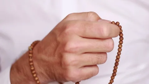Male hand counting beads 動画素材 75048862