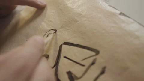 Male hand finished write calligraphic Arabic letters Stock Footage 102321942