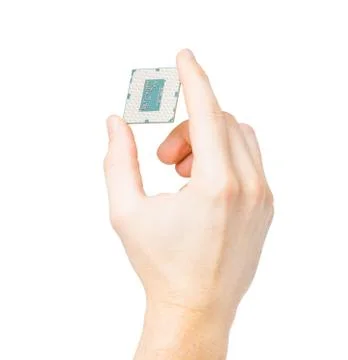 Male hand holding computer's processor - on a white background Stock Photos