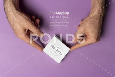 Male hand holding a pill box in front of purple background mock-up series 464 PSD Template