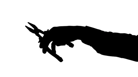 Male hand holding pliers Stock Footage 79911341