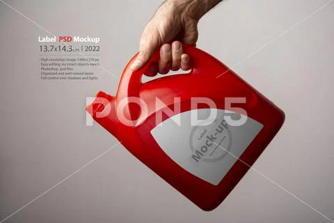 A male hand holding a red kitchen detergent bottle mock-up series PSD Template