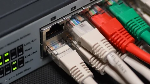 Male Hand Inserts The Blue Data Lan Cable rj45 Into Network Switch Stock Footage 116622827