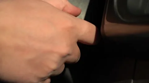Male hand inserts the ignition key Stock Footage 156746522
