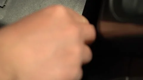 Male hand inserts the ignition key Stock Footage 166996364