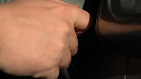 Male hand inserts the ignition key Stock Footage 167930720