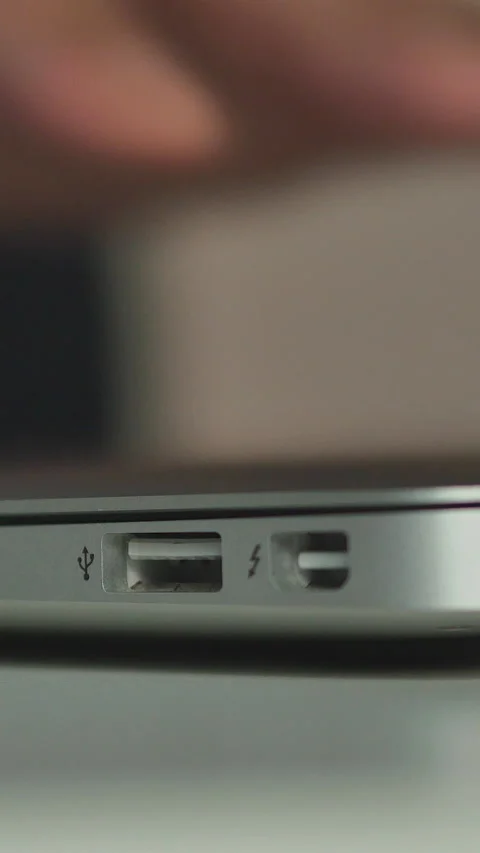 Male Hand Inserts USB Flash Drive Into Laptop. Vertical Stock Footage 270480748