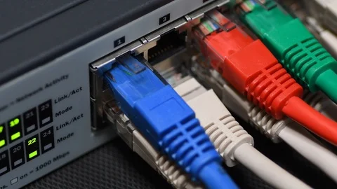 Male Hand Inserts The Yellow Data Lan Cable rj45 Into Network Switch Stock Footage 116622742