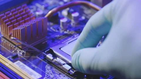 Male hand Installing a computer processor CPU. Personal computer repair. Modern Stock Footage 194644361