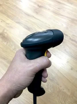 Male hand keeping a barcode reader Stock Photos