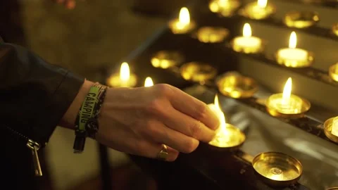 Male hand lighting candle Stock Footage 133575558