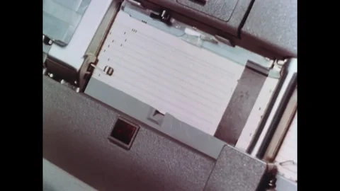 Male Hand Making Notes On COmputer Punch Card Vídeos de archivo 119285708