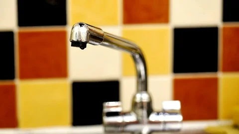 Male hand opens kitchen tap / faucet Stock Footage 71101427