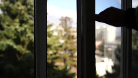 Male hand opens the window Stock Footage 171765748
