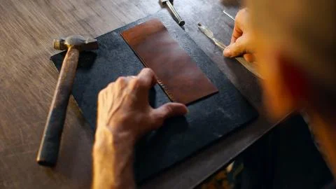 Male hand performs work with tools. Stock Photos