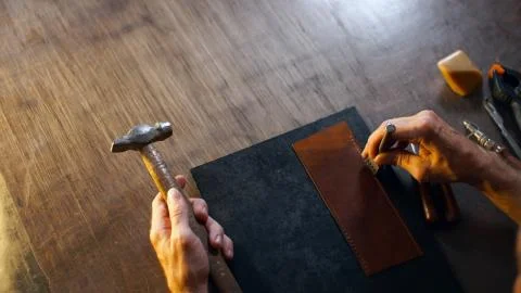 Male hand performs work with tools. Stock Photos