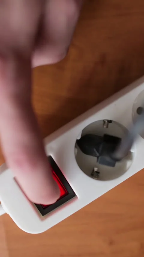 Male Hand Plugs In The Plug In Socket Electric Extension Cord And Turn On The Stock Footage 271581422