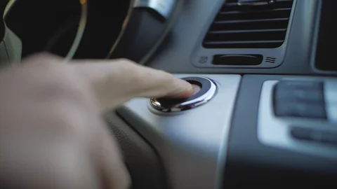 Male hand presses the start button in the car Stock Footage 103141303