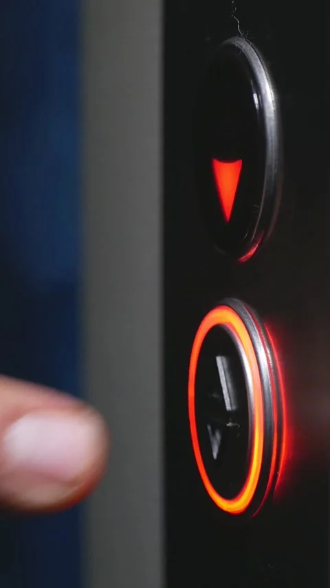 Male hand pressing elevator button in office center or hotel..vertical video Stock Footage 289793353