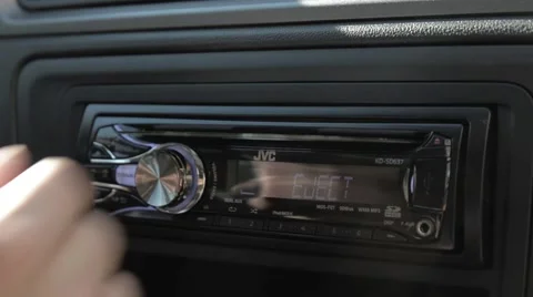 Male hand pulls out of sd disk recorder in the car Stock Footage 51756979