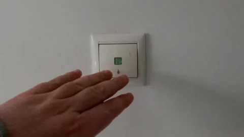 Male hand Push On the Light Switch Stock Footage 148397592