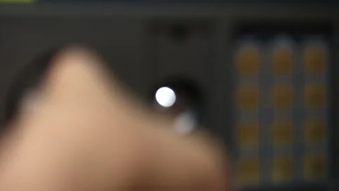 Male hand pushing security code on safety box with electronic lock Stock Footage 208819189