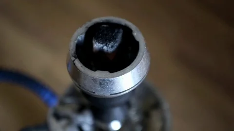 Male hand puts ember into the hookah and closes the lid close-up Stock Footage 100854543