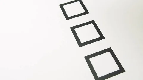 Male hand putting mark on checkboxes of checklist Stock Footage 71043175