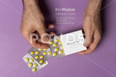 Male hand putting pills tablets in the box mock-up series 456 PSD Template