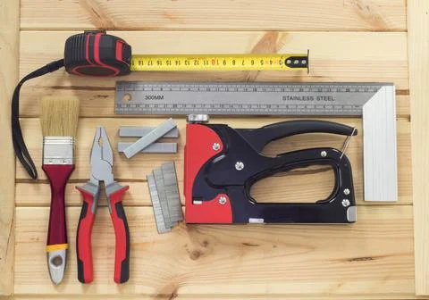 Male hand tool stapler square screwdriver Stock Photos