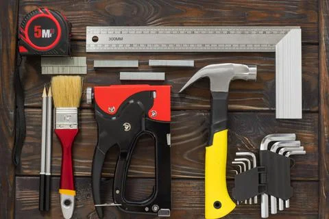 Male hand tool stapler square screwdriver Stock Photos