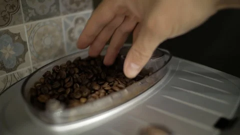 Male hand touching coffee beans Stock Footage 98809151
