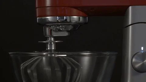Male hand turns on a red kitchen mixer Stock Footage 76639680