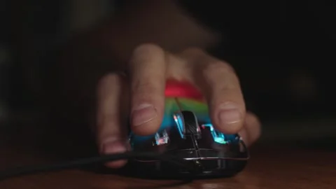 The male hand is used by a computer mouse to click and scroll Video stock 287269517