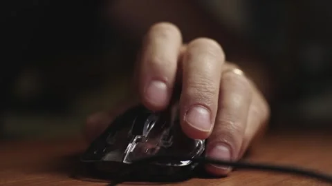 The male hand is used by a computer mouse to click and scroll Video stock 287269679