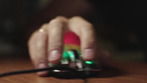 The male hand is used by a computer mouse to click and scroll Video stock 287269747